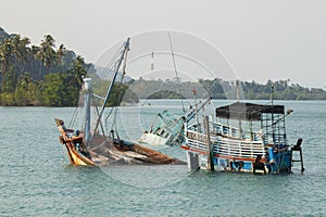 Old sunken and abandoned fishing boats, Gulf of Thailand photo