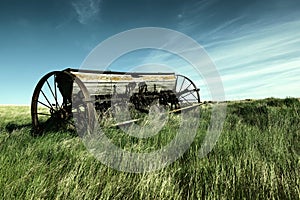 An old swather bereft on the plains.