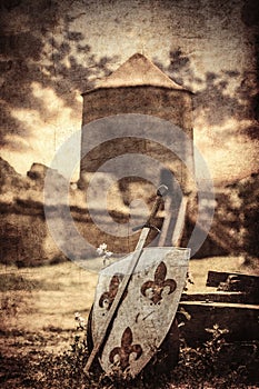 The old sword and shield on the castle background