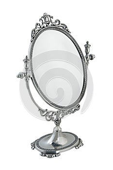 Old table mirror in a beautiful silver frame.