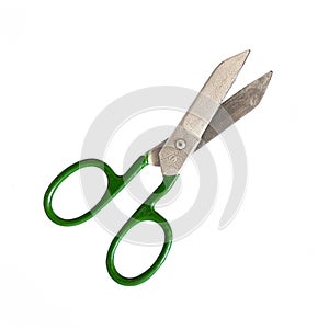 Old tailor scissors isolated on white background. Sewing tools