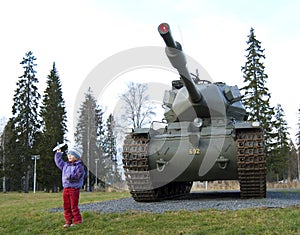 Old tank and girl in Boden