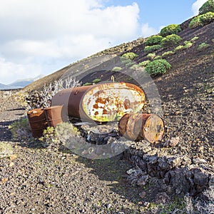 Old tank in volcanic landscape