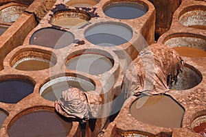 Old tannery in Fez, Morocco. The tanning industry in the city is considered one of the main tourist attractions. The tanneries are