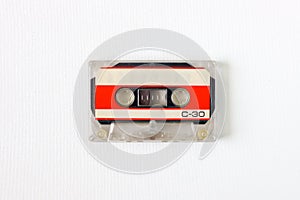Old tape cassette, old or aged wood background. ÃÂ°solated casette photo