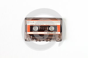 Old tape cassette, old or aged wood background. Ä°solated casette