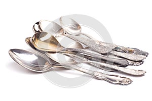 Old teaspoons isolated on white background