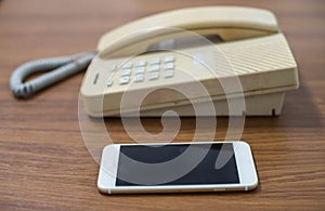 Old telephone and mobile,concepts compare new and old technologies .