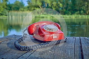 Old telephone in nature