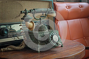 Old telephone retro rotary phone antique style in vintage room