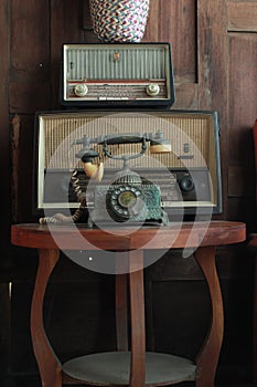 Old telephone retro rotary phone antique style in vintage room