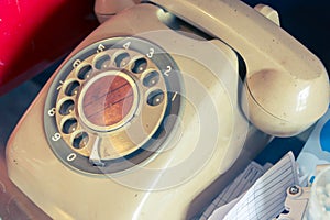 An old telephone with rotary dial