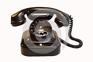 Old telephone on wood / vintage style/ white background