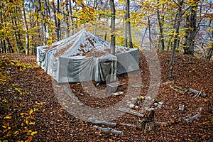 Old tent in the autumn forest, Slovakia