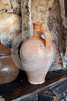 Old terracotta clay kitchenware jars and pots, ancient cookware