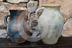 Old terracotta clay kitchenware jars and pots, ancient cookware