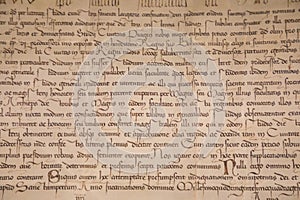 Old text in medieval book as background