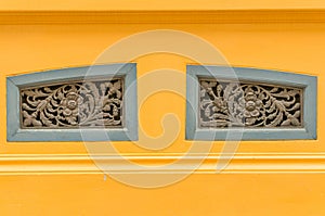 Old Thai style air ventilate window in flower shape photo