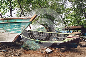 Old thai wooden boat on the beach