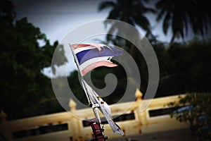 Old thailand flag blowing in the wind