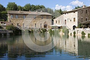 Old thermal baths in the medieval village Bagno Vignoni,  Italy