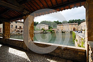 old thermal baths in the medieval village Bagno Vignoni, Tuscany, Ital
