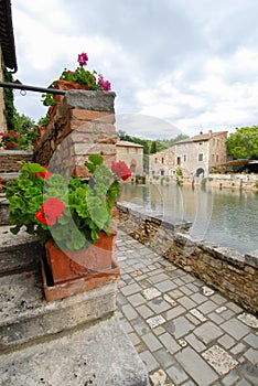 Old thermal baths in the medieval village Bagno Vignoni, Tuscany, Ital