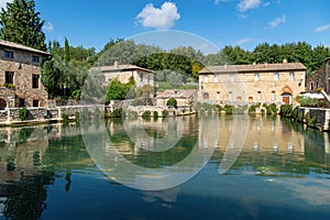 old thermal baths in the medieval village Bagno Vignoni photo