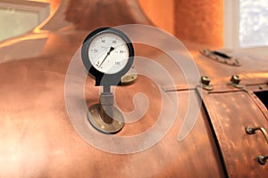 Old thermometer on the tank