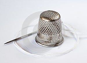 Old Thimble and a Needle