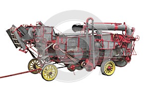 Old threshing machine isolated.