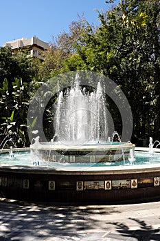 Old tiled fountain in Plaza la Alameda Marbella Spain photo