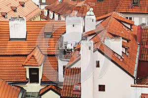 Old tiled red Prague roofs. Czech republic