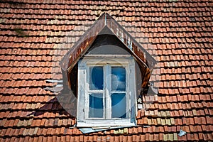 Old tiled roof and window