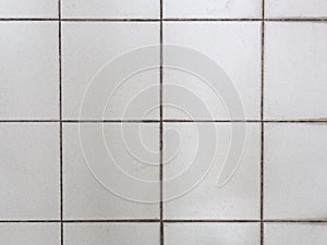 Old tiled white wall texture