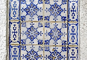 Old tiles pattern on white wall in Petropolis