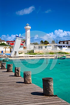 Old tilted and new lighthouses in Puerto Morelos