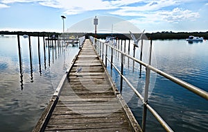 Old timber jetty on the waterways of Warneet in south east Victoria