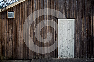 Old timber wall with timber door