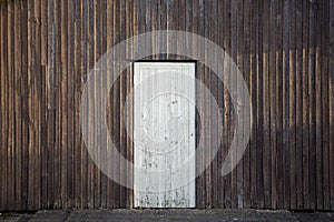 Old timber wall with timber door