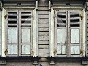 Old timber windows with shutters in riga latvia