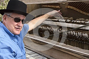 Old Time Piano Player Tickling the Ivories