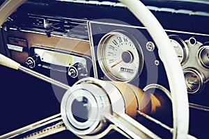 Old timer car steering wheel and dashboard