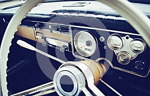 Old timer car steering wheel and dashboard