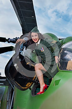 Old-timer helicopter and girl