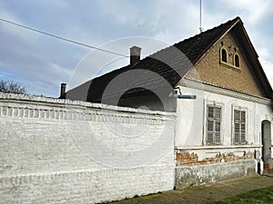 Old timeworn rustic house, typical architectural style for 19th century architecture in Vojvodina