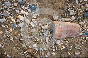Old tin can rusty beach garbage