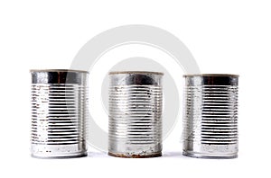 Old tin cans  on white