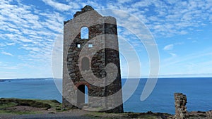 Old Tin Mine remains on cliffs in Cornwall UK