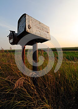 Old Tin Roadside Mailbox in the Prairies